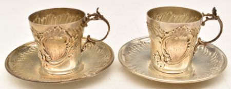 Pair of late 19thC French silver cups and saucers with embossed decoration, French silver marks