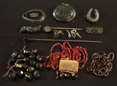 A collection of Victorian jet beads, beaded necklace and brooches