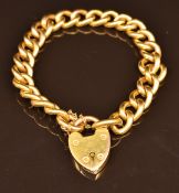A c1900 15ct gold curb link bracelet with heart padlock clasp, 20.8g