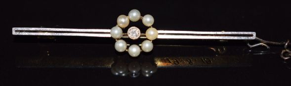 Art Deco 18ct gold brooch with a platinum finish set with a diamond and seed pearls, 2.8g, 4.6cm