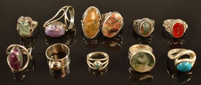 Four silver rings set with moss agate and seven rings set with various hardstones/ quartz