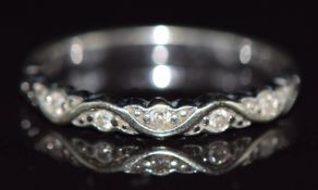 A 9ct white gold ring set with diamonds, 2g, size M