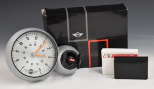 Mini Cooper novelty cuckoo clock with miniature Mini Cooper with sound effects rather than cuckoo,