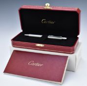 Cartier propelling ballpoint pen with brushed silver finish, in case, box and with instruction