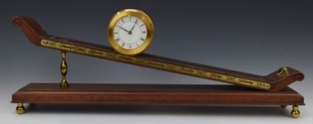 Swiss 'Imhof' novelty gravity or mystery inclined plane clock, length 61cm