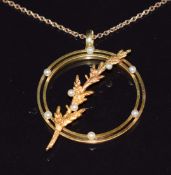 Edwardian 9ct gold necklace in a foliate design set with seed pearls (2.8cm diameter), on 9ct gold