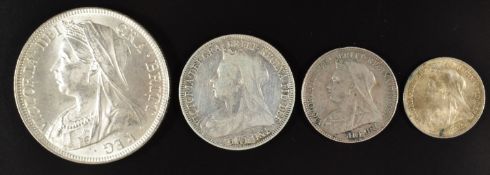 Four Victorian silver coins comprising 1897 veiled head half crown (NEF), an 1896 shilling (F), a