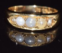 Edwardian 18ct gold ring set with pearls, 3.9g, size K