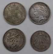 Liberty USA 1922 Dollar together with two Mexican coins, one for the 1968 Olympics and a 1937