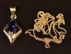 A 9ct gold pendant set with a tanzanite on 9ct gold chain, 2g