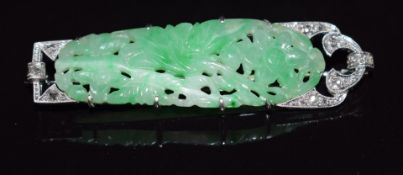 Art Deco 18ct white gold and platinum brooch set with a carved jadeite plaque and rose cut diamonds,