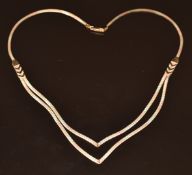 A 9ct gold tri coloured necklace, 7.6g