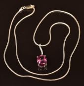 A 9ct white gold pendant set with pink sapphire and white sapphires (1.7g) on silver chain