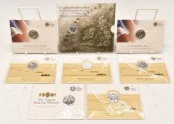 Seven Royal Mint silver coins comprising four fine silver 2014 Outbreak UK £20, two 2013 A