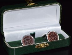 A pair of Holland & Holland cufflinks in the form of shotgun cartridges, in fitted leather case with