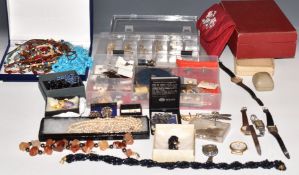 A collection of jewellery including silver earrings, vintage earrings, beaded necklaces, silver