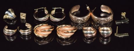 Five pairs of 9ct gold earrings including tri-coloured hoops and a pair made up of polished and