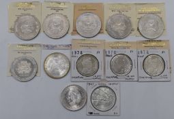 Five Singapore silver 10 Dollar coins and three proof one Dollar examples, most with certificates,