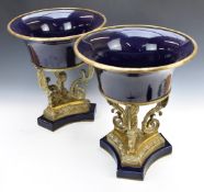 A pair of French brass and porcelain jardinière stands, H41cm