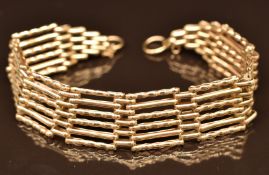 A 9ct gold gate bracelet,13.4g