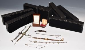 Four silver watches, five silver bracelets and two silver rings