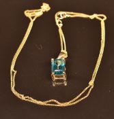 A 9k gold pendant set with an emerald cut green topaz, on 9ct gold chain, 1.9g