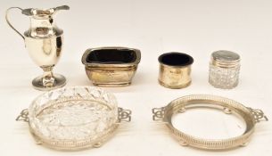 Hallmarked silver jug, height 9cm, pair of Elkington butter dish holders and one cut glass dish to