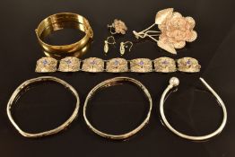 Silver filigree brooch, bracelet and earrings, together with bangles