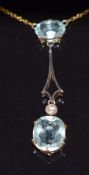 Edwardian 9ct gold necklace set with an oval and cushion cut aquamarine and a diamond, 3g, 36cm