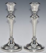Pair of George V hallmarked silver candlesticks, Birmingham 1911, maker Levi & Salaman, height 20.