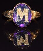 Victorian / Edwardian ring set with an amethyst mounted with a gold M set with seed pearls, 3.8g,