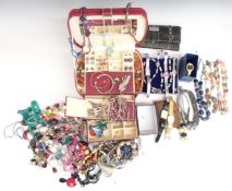 A collection of costume jewellery including agate and other necklaces, silver earrings, pearl