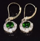 A pair of 9ct gold earrings set with diopside and diamonds, 2.6g
