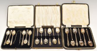 Three cased sets of hallmarked silver tea or coffee spoons, one set also having sugar tongs,