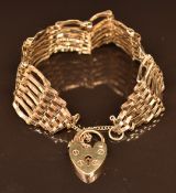 A 9ct gold gate bracelet with heart padlock clasp, 11.5g