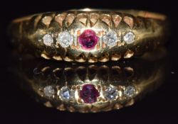 An 18ct gold ring set with a ruby and diamonds, Chester 1918, 1.8g, size N