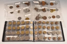 An amateur collection of overseas coinage contained in an album and collector's pages
