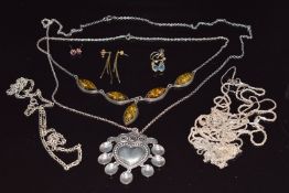 A collection of silver including a bracelet set with pressed amber, necklace, curb link necklace and