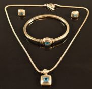 A suite of silver Links of London jewellery set with blue topaz comprising earrings, necklace and