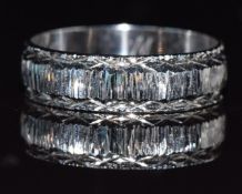 An 18ct white gold ring with textured decoration, 2.7g , size L