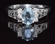 A 9k white gold ring set with an oval sapphire and diamonds, 3g, size Q
