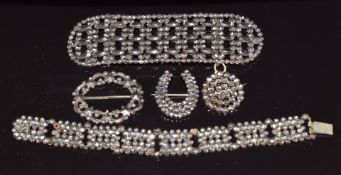 Victorian cut steel bracelet, buckles, horseshoe brooch and circular brooch