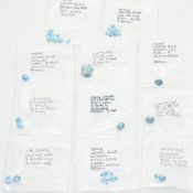 Forty loose London blue topaz including 3ct trilliant cut, 3ct oval cut, 3.9ct concave emerald