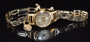 Oris ladies wristwatch with gold hands and hour markers, silver dial and signed movement, on 9ct