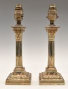 Victorian pair of hallmarked silver Corinthian column candlesticks converted to table lamps,