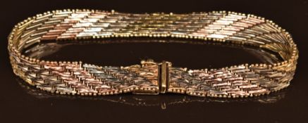 A 9ct gold tri-coloured bracelet, 26.1g