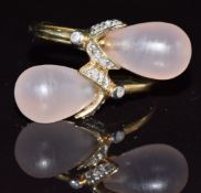 A 9k gold ring set with pink chalcedony and diamonds, 4.4g, size M