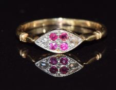 An 18ct gold ring set with rubies and rose cut diamonds,1.5g, size K