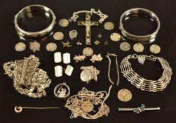 A collection of silver jewellery including two bangles, white metal bracelet, chains, bracelet, St