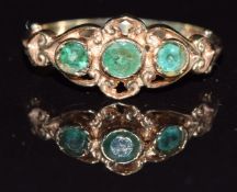 A 9ct gold ring set with emeralds, 1.7g, size M
